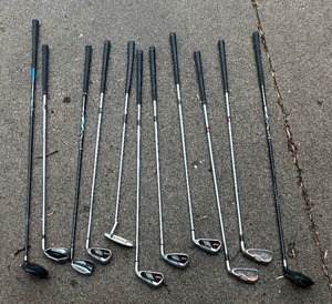 lot 140 image: Variety of Golf Clubs by Taylor Made, Odyssey, Callaway and Precept