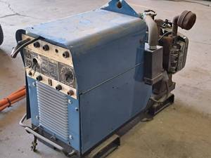 lot 134 image: Miller ACDC Welder with Onan CCKA-MS 22376 Generator