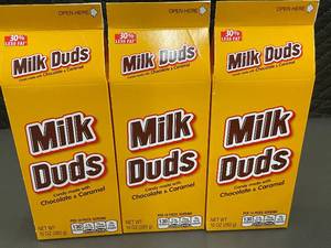 lot 409 image: Set of 3 Milk Duds Candy Boxes with Chocolate & Caramel