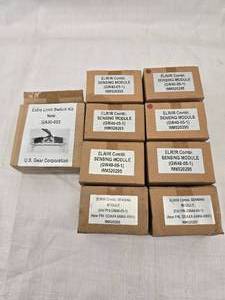 lot 110 image: (8) New Garage Door Sensing Modules and (1) Limit Switch Kit