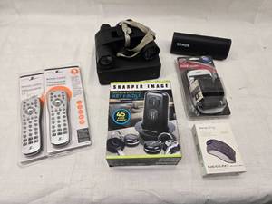lot 128 image: Universal Remotes, Key Finder, Binoculars, Phone holder, Headphone Eye Mask and Bluetooth Speaker