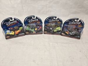 lot 27 image: (4) New Packs of Disney Wild Racers Collectables