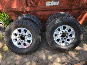 lot 3 image: 35x12.50R18 Goodyear Duratrac Tires and Wheels off 2015 GMC Denali 3500