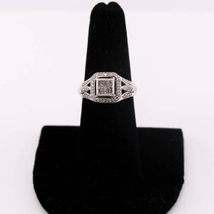 lot 17 image: 10k White Gold Ladies Halo Ring