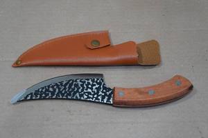 lot 15 image: Carbon Steel Viking Co Hammered Knife