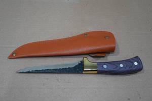 lot 21 image: Carbon Steel Viking Co Hammered 11 Knife
