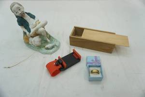 lot 57 image: Fisherman fishing , superman ring