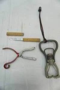 lot 63 image: Rapala Hook remover