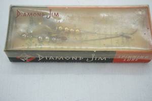 lot 91 image: Vintage Diamond Jim Garden Worm Spinner - in original packaging