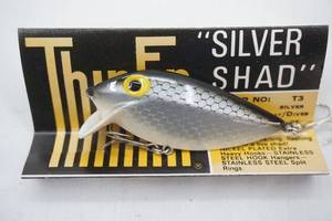 lot 125 image: Vintage Thin Fin Silver Shad in original packaging