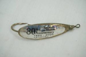 lot 201 image: Vintage Johnsons Silver Minnow 80th Anniversary Sticker on it