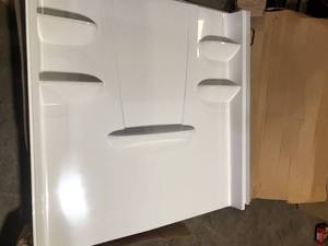 lot 18 image: Composite 8 in. x 60 in. x 62 in. 1-Piece Direct-to-Stud BathtubShower Wall Panel in White by Aquatic Damaged  Customer Returns See Pictures