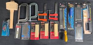 lot 31 image: Craftsman and Footprint Tool Collection with Clamps, Saws, and Level