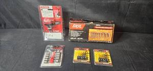 lot 37 image: Craftsman Mini Palm Nailer and Skil Drill Bit Set Collection