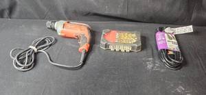lot 46 image: Milwaukee Power Drill, Drill Bit Set, and 15ft Workshop Extension Cord Collection
