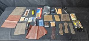 lot 51 image: Comprehensive Leatherworking Tool and Material Set