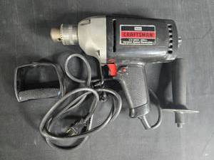 lot 65 image: Craftsman 38-HP Reversible 12-Inch Drill with Accessories