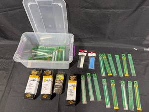 lot 91 image: Large Assortment of Knife Sharpening Belts, Music Wires, and Sanding Needles