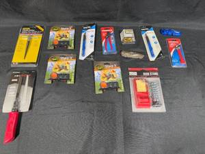 lot 93 image: Assorted Tool Collection with Knives, Reamers, Sharpener, and Iron Stand