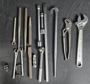 lot 126 image: Mixed Lot of Hand Tools Including Wrench, Pliers, and Socket Set