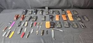 lot 130 image: Large Lot of Multi-Purpose Pocket Knives and Knife Sheaths