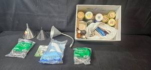 lot 170 image: Variety of Plumbing Supplies with Funnels and Container Cap Lids