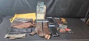 lot 190 image: Lot of Leather Remnants and Skil Auto Sharpener