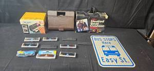 lot 192 image: Lot of Sunglasses, Wet Wheel Machine, Jet Torch Kit, Heated Seat Cushion, and Bus Stop Sign