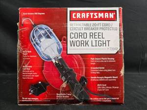 lot 214 image: Craftsman Cord Reel Work Light with Circuit Breaker and Metal Guard