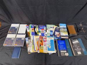 lot 238 image: Extensive Lot of Notebooks, Legal Pads, and Maps