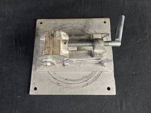 lot 253 image: Metal Vise with Mounting Plate and Long Electrical Cord