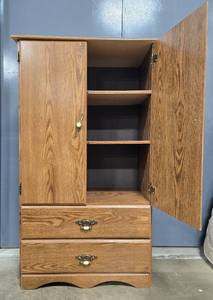 lot 314 image: Oak Finish Wood Armoire with Shelves and Drawers