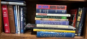 lot 329 image: Collection of Automotive, Fishing, and Geography Books