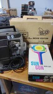lot 58 image: Bell & Howell Projector 346A, 8mm Movie Editor and Sylvania Sun Gun
