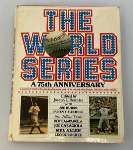 lot 36 image: Autographed By Joe Reichler To Herb Carneal The World Series  Book  (From Herb Carneals Estate)