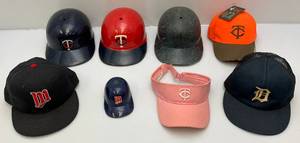 lot 62 image: Misc. Vintage Minnesota Twins Baseball Hard Hats & More