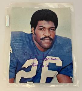 lot 92 image: Minnesota Vikings CLINTON JONES Autographed 8 x 10 Photograph In Protective Sleeve