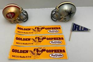 lot 233 image: Vintage Sports Collectibles Including Miniature NFL Helmets Dallas, San Francisco, Golden Gopher Bumper Stickers And Vintage Dallas Felt On Felt Miniature Pennant