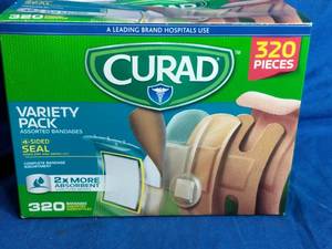 lot 217 image: New Curad Assorted Bandages 320 Variety Pack