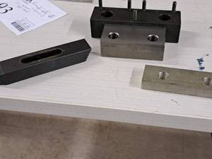lot 96 image: Lot of (4) Assorted Machining Tooling Accessories - Vise Jaws, Clamp Bar