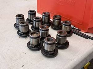 lot 115 image: (11) Assorted Tapping Heads and (3) Extension Rods -