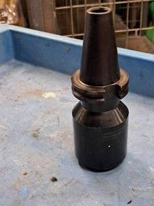 lot 142 image: 2-12 Milling Machine Tool Holder - Carboloy Systems CV40-EM4.62-1500 L.C. 1887