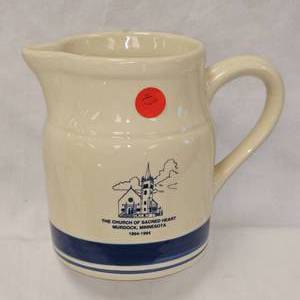 lot 43 image: Roseville Stoneware 1894-1994 Church of Sacred Heart Murdock, MN Cream Pitcher