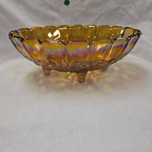 lot 54 image: Amber Carnival Glass Tri Footed Fruit Bowl by Indiana Glass Company