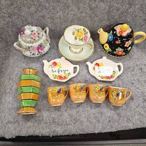 lot 92 image: Art Deco Sugar Shaker, Tea Pot, 4 Japan Hand painted Teacups, 2 Tea Plates, Vintage Taylor and Kent Cup and Saucer Set wHand painted Double Handle Sugar Bowl wlid