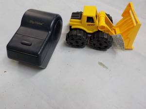 lot 63 image: Construction Vehicle Toy and Zip No...