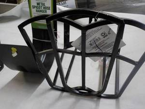 lot 103 image: 2 Metal Hose Hangers...
