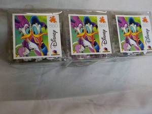 lot 264 image: 3 ct 850 pc Disney Puzzles...