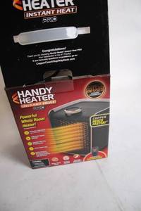 lot 11 image: Handy Heater Instant Heat Pro Room Heater with Copper Infused Ceramic Technology
