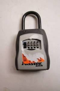 lot 63 image: Used Master Lock Portable Combination Lock Box